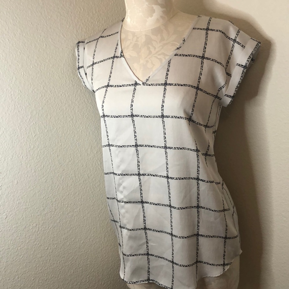 Black checkered white blouse